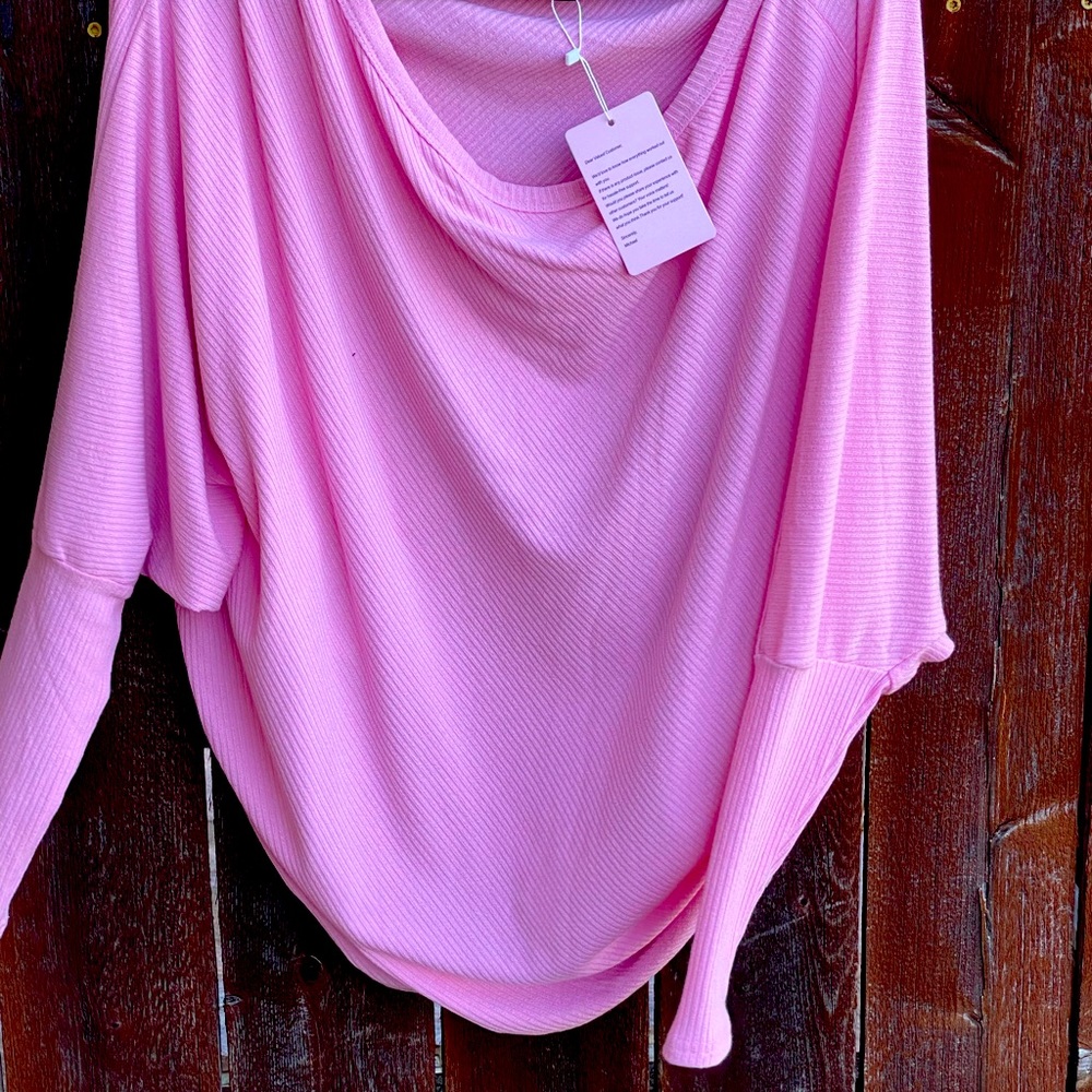 Woman’s pink bat wing long sleeve shirt